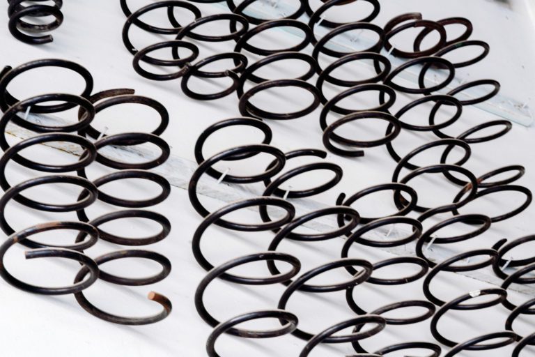 How much does it cost to replace a coil spring?